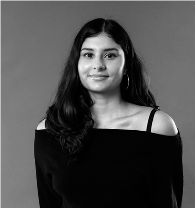 Black and white portrait photograph of artist Anya Kalsi